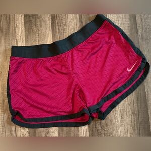 Nike Dri-Fit Mesh Running Shorts Size women’s medium. Dark pink/fuschia